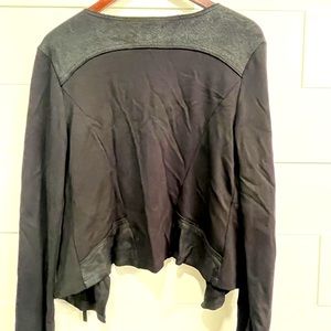 Asymmetrical zip up cardigan .